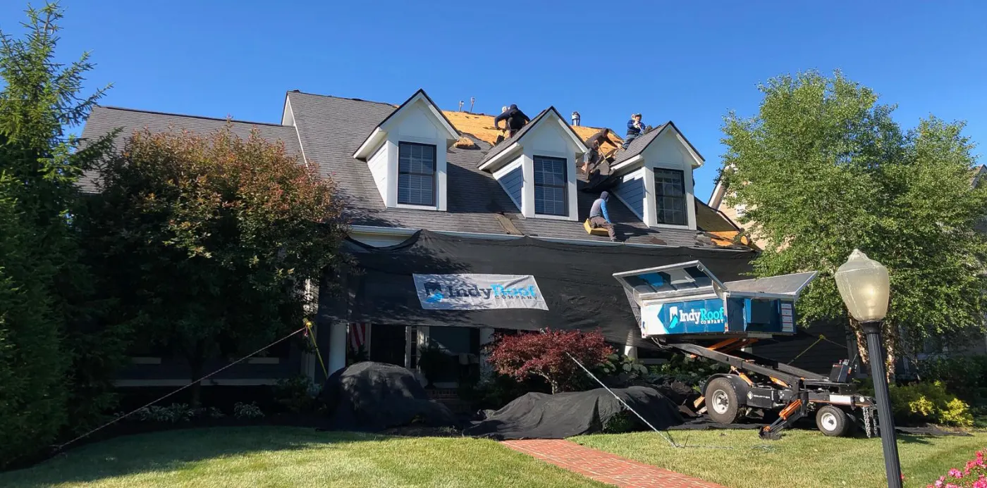 Tarping and dry-in on a Laurel Lakes commercial roof